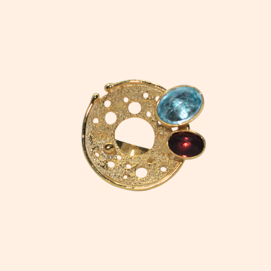 Solar Bloom – 18K Gold-Plated Ring with Blue Topaz & Garnet | Handcrafted Celestial-Inspired Jewelry
